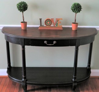 sofa table finished with gel stain up against a wall